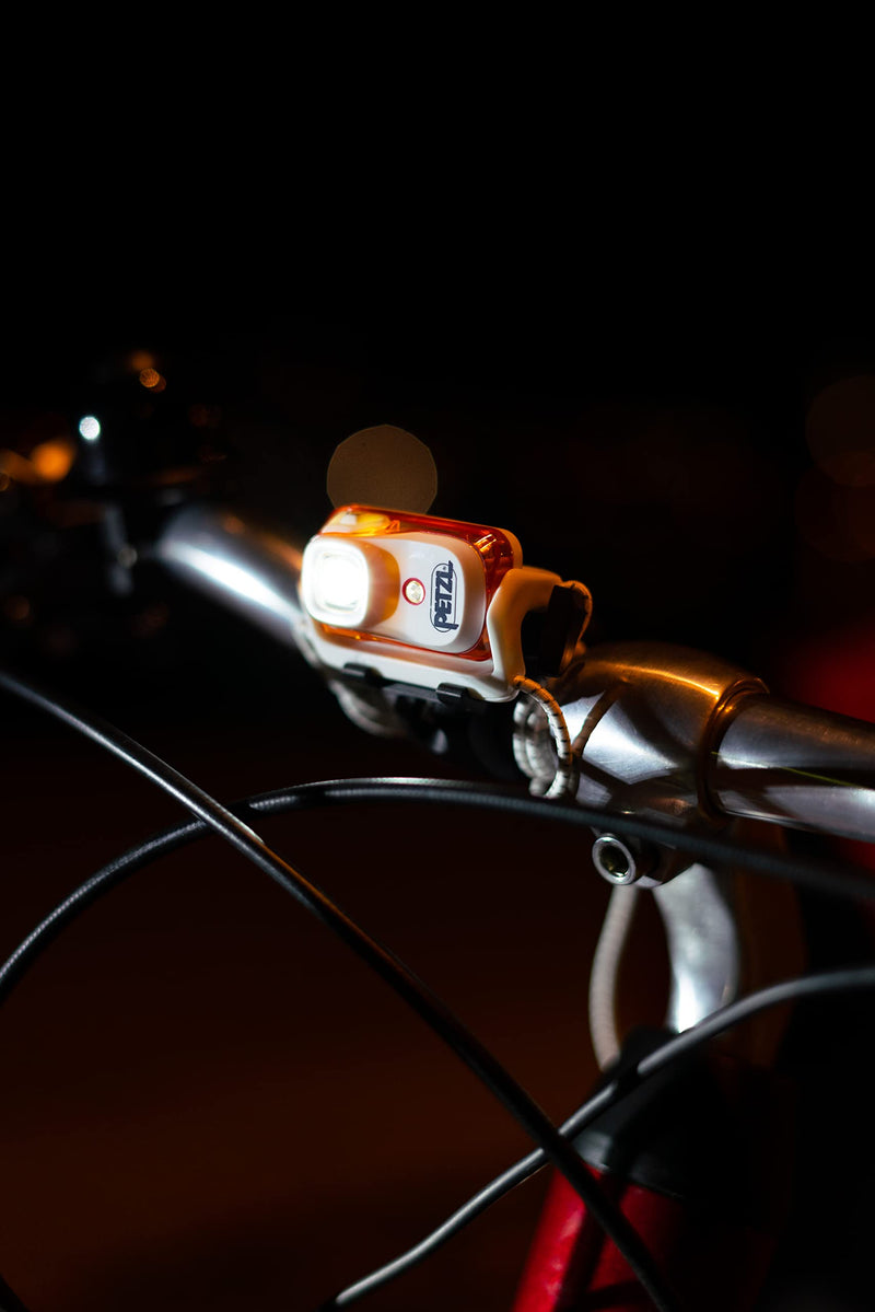 PETZL Bindi Headlamp - Ultra-Compact Rechargeable 200 Lumen Headlamp Designed for Everyday Athletic Activities - Emerald One Size