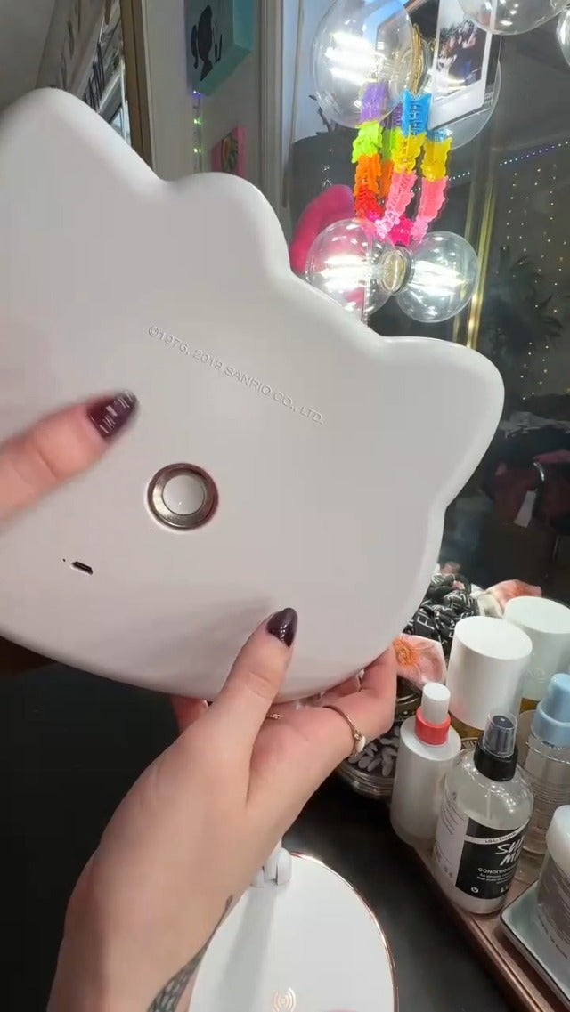 Impressions Vanity Hello Kitty LED Handheld Mirror, Makeup Vanity Mirror with Standing Base and Adjustable Brightness