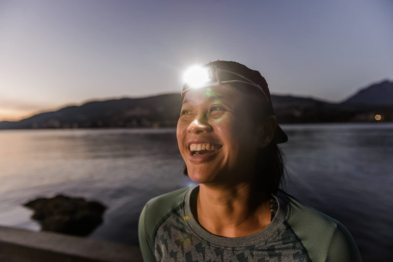 PETZL Bindi Headlamp - Ultra-Compact Rechargeable 200 Lumen Headlamp Designed for Everyday Athletic Activities - Orange