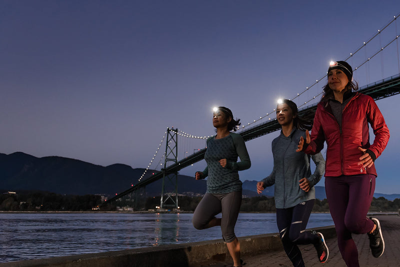 PETZL Bindi Headlamp - Ultra-Compact Rechargeable 200 Lumen Headlamp Designed for Everyday Athletic Activities - Orange