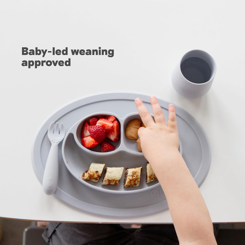 ezpz Mini Mat (Sage) - 6 -12 Months+ - 100% Silicone Suction Placemat + Divided Plate with Three Compartments - Supports Baby-Led Weaning - Designed for Highchair, Table, and Travel Sage 12 Months +