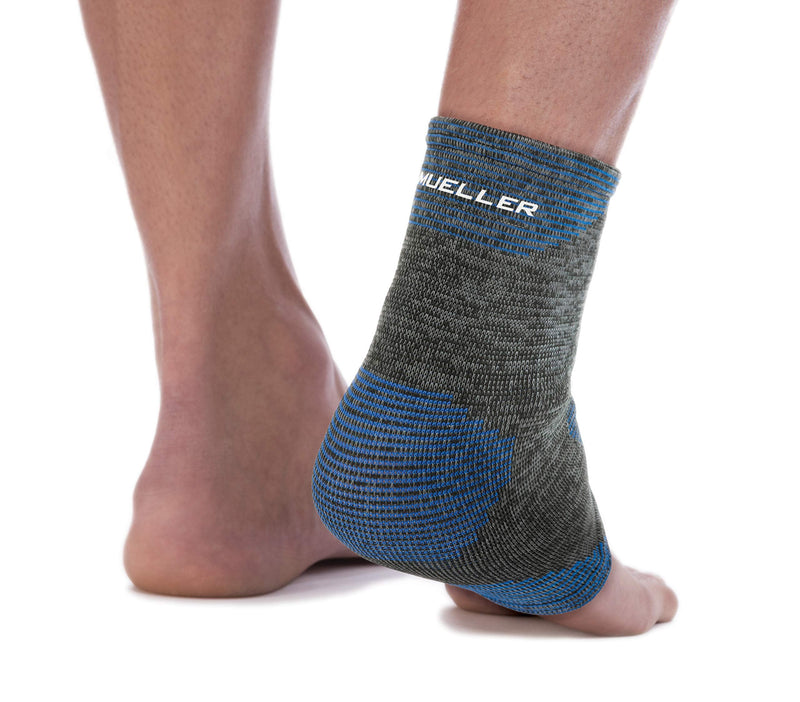 Mueller Sports Medicine FIR 4-Way Ankle Support Sleeve, Ankle Pain Relief Support for Men and Women, Ideal for Sprains, Strains, Arthritis, Black/Blue Medium/Large - BeesActive Australia