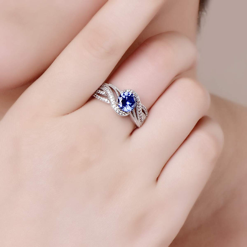 Empsoul 925 Sterling Silver Women's Created Round Royalblue Tanzanite Cubic Zirconia Pave Diamond 4-Prong Mystic Orbit Twist Wedding Ring Size 7 US7 - BeesActive Australia