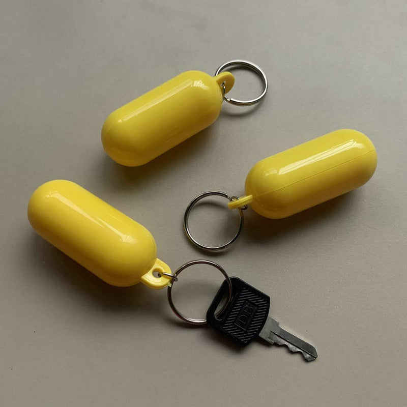 4Pcs Plastic Floating Keychain Pill-shape Floating Key Ring Key Float Keychain Pendant for Boating Fishing Kayak Surfing Sailing and Outdoor Sports Accessories, White and Yellow - BeesActive Australia