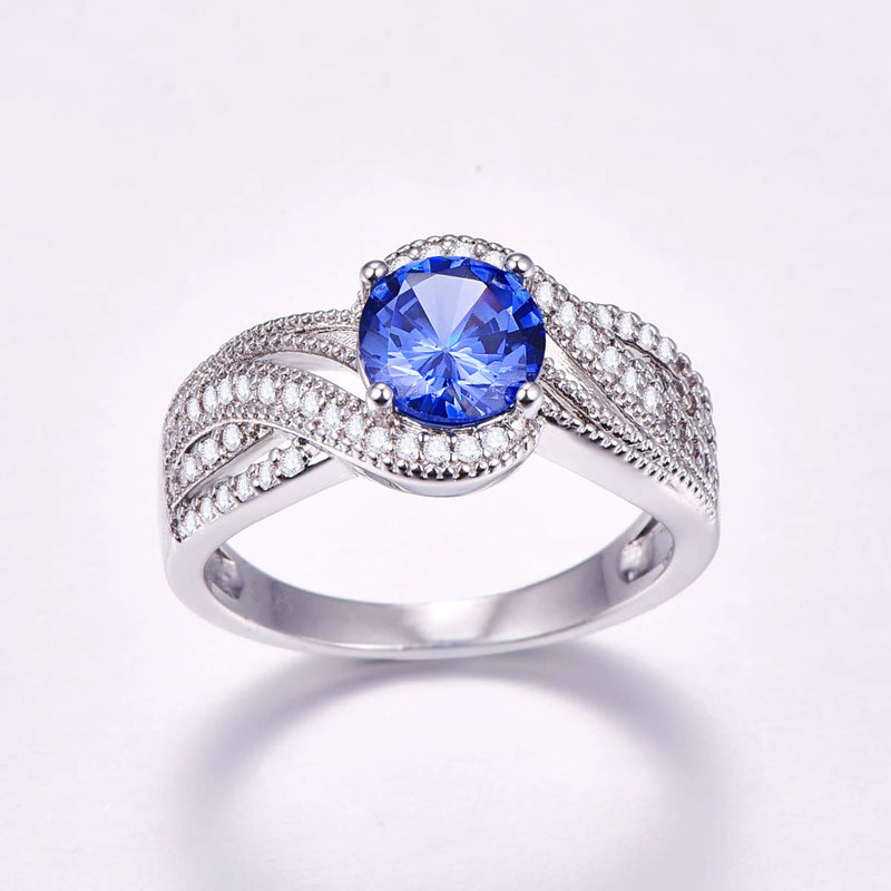 Empsoul 925 Sterling Silver Women's Created Round Royalblue Tanzanite Cubic Zirconia Pave Diamond 4-Prong Mystic Orbit Twist Wedding Ring Size 7 US7 - BeesActive Australia