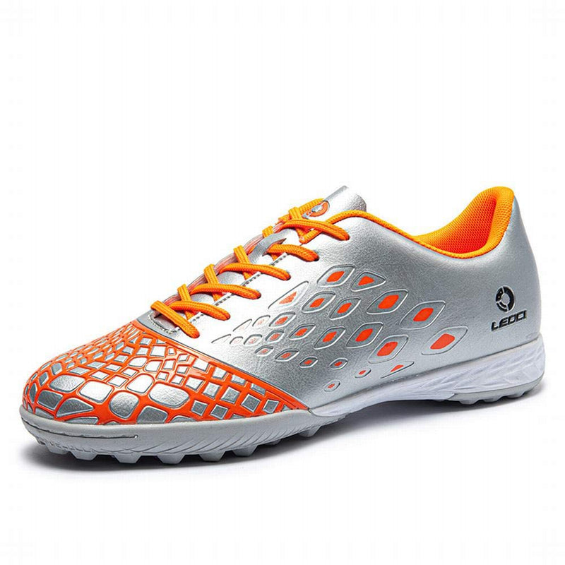 LEOCI Soccer Shoes - Turf Sole Men & Women Kid's Academy Outdoor Football Durable Emboss Rubber Shoes 8.5 Women/7.5 Men Silver/Orange - BeesActive Australia